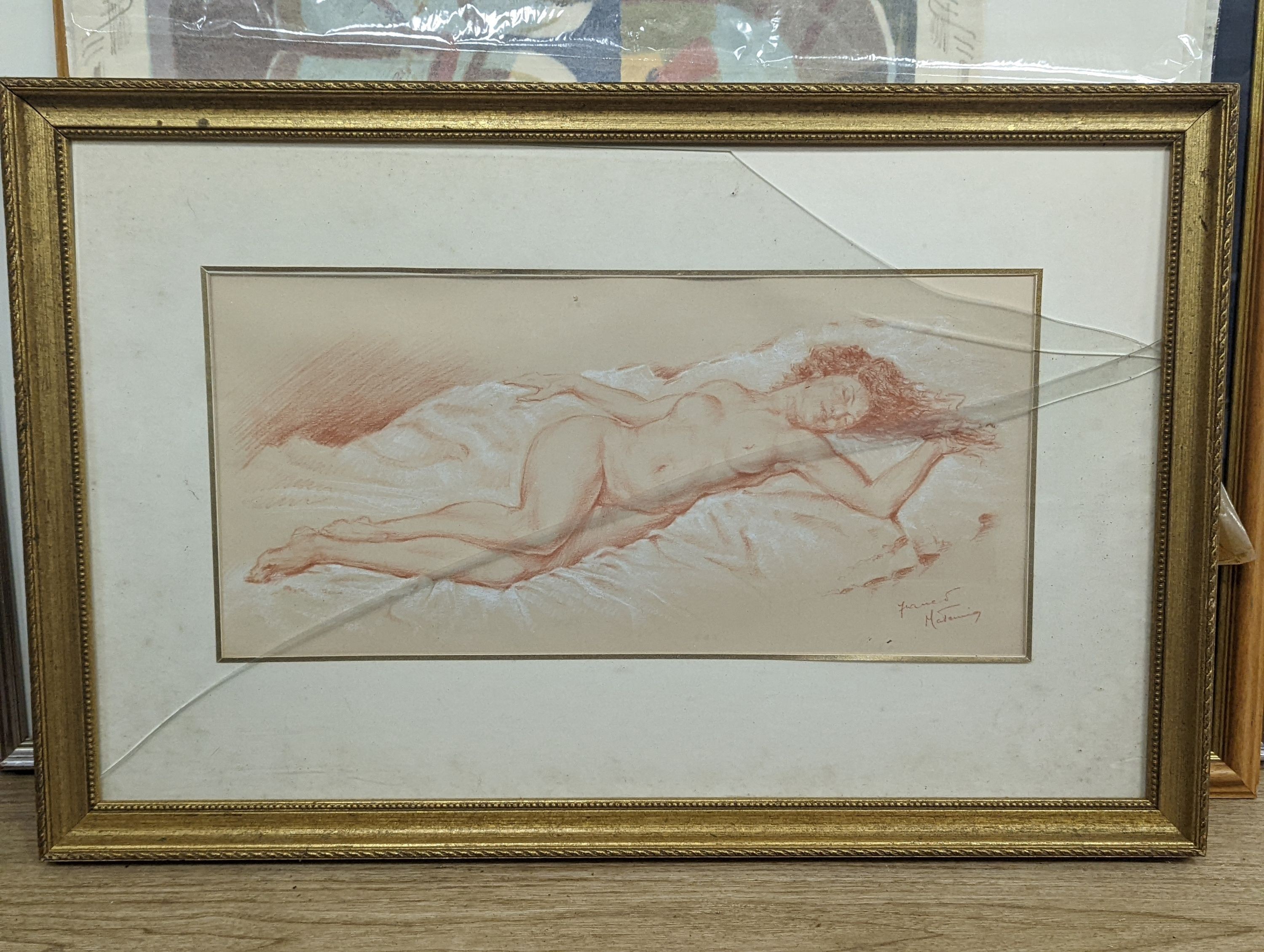 Franco Matania (1922-2006), sepia and white chalk, Sleeping female nude, signed, 21 x 46cm